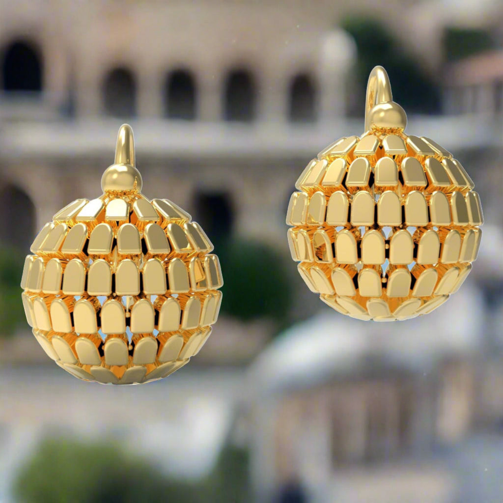 Gold or silver half-globe earrings consisting of small reflective tiles on the surface, and the "S" curve Roman hook at the back.